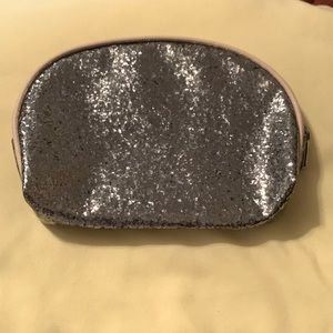 NWOT sparkly/silver cosmetics case